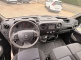 a dashboard of a car with a steering wheel and dashboard controls