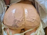 a close up of a woman ' s butt with a cloth around it