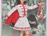 Poupée Barbie « marin » Coca-Cola avec une cape rouge et une robe blanche