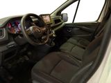 a view of the inside of a vehicle from the driver ' s seat