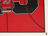 a red and black poster with a lego figure on it