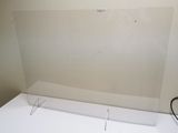 a white desk with a computer on top of it