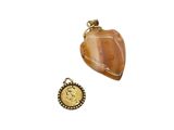 an image of a picture of a pendant and a coin on a white background