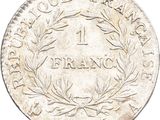 a close up of a coin on a white background