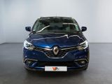 the front view of a blue car parked in a showroom