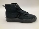 a close up of a black shoe with a zipper on the side