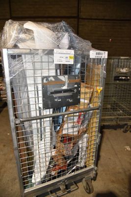 a metal cart with many items in it in a warehouse