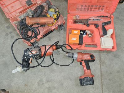 two tools that are sitting on the floor