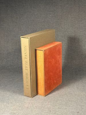 two books sitting next to each other on a table