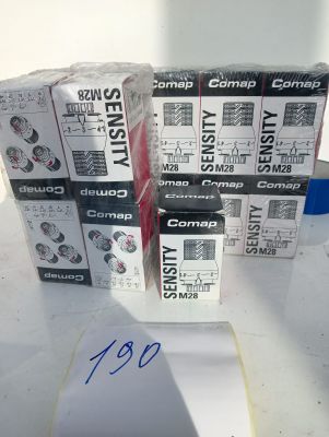 several boxes of computer equipment sitting on top of a table