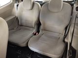 two seats in the back of a car that are empty