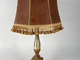 an image of a table lamp with a brown shade on it