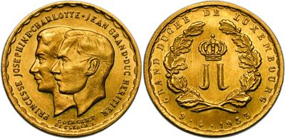 a gold coin with a crown and a crown on it