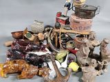 many different types of figurines sitting on a table
