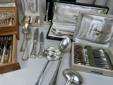 a table with silverware and silverware on it