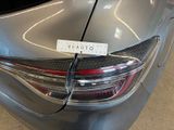 a close up of a car with a sticker on the back of it