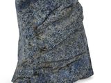 an image of a rock with a blue stone on it