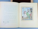 a picture of an open book with a picture of a woman riding a horse