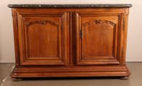 Buffet de chasse en chêne clair mouluré et sculpté de motifs…