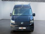 a black van that is parked in a room
