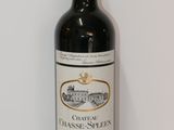 a bottle of wine that is sitting on a table