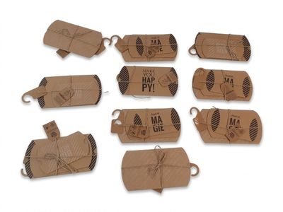 several pieces of brown paper are wrapped in brown paper and tied with twine