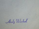 the back cover of a book with a purple writing on it