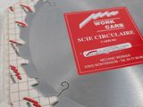 two circular saw blades sitting on top of each other