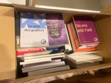 a box full of books sitting on a table