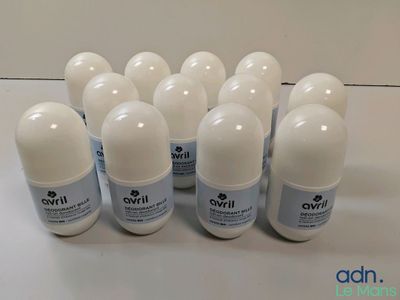six bottles of deodorant sitting on a counter top