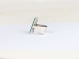 sterling silver ring with a green stone in the middle