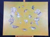 a picture of a painting of birds on a easel
