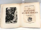 un livre ouvert sur lequel est dessiné un homme et une femme