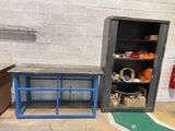 a room with a table, shelves, and a fire hydrant in it