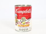 a can of campbell ' s chicken alphabet soup on a white surface