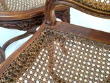 two chairs that are sitting next to each other