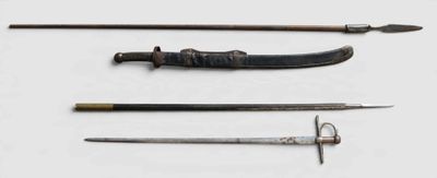 several different types of weapons are displayed on a white surface