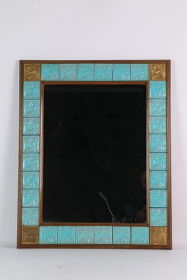 turquoise and gold mosaic mirror with a wooden frame