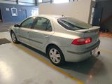 a silver car that is parked in a garage