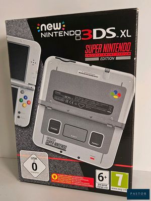 une boîte contenant une Nintendo 3DS et une manette de jeu