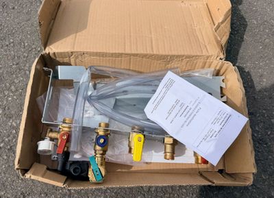 a cardboard box with a bunch of hoses in it