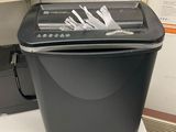 a paper shredder sitting on top of a counter
