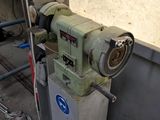 a machine that is sitting on the side of a building
