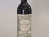 a bottle of wine that is sitting on a table