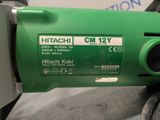 a close up of a green machine with a label on it