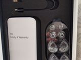 a box with a battery and a charger inside of it