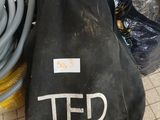 a black bag that is sitting on the floor