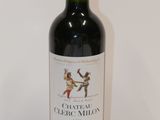 a bottle of wine that is sitting on a table