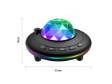 a close up of a speaker with a light on top of it