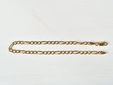 gold plated chain on a white background